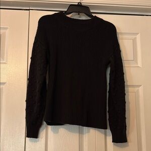 Black Ribbed Sweater with Textured Sleeves